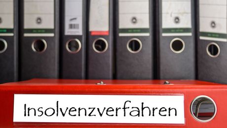 Aktenordner, ein Aktenordner mit Aufschrift Insolvenzverfahren